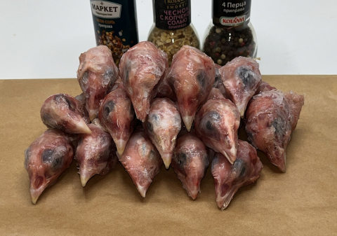 Головы кур корнишонов (попадаются перья)